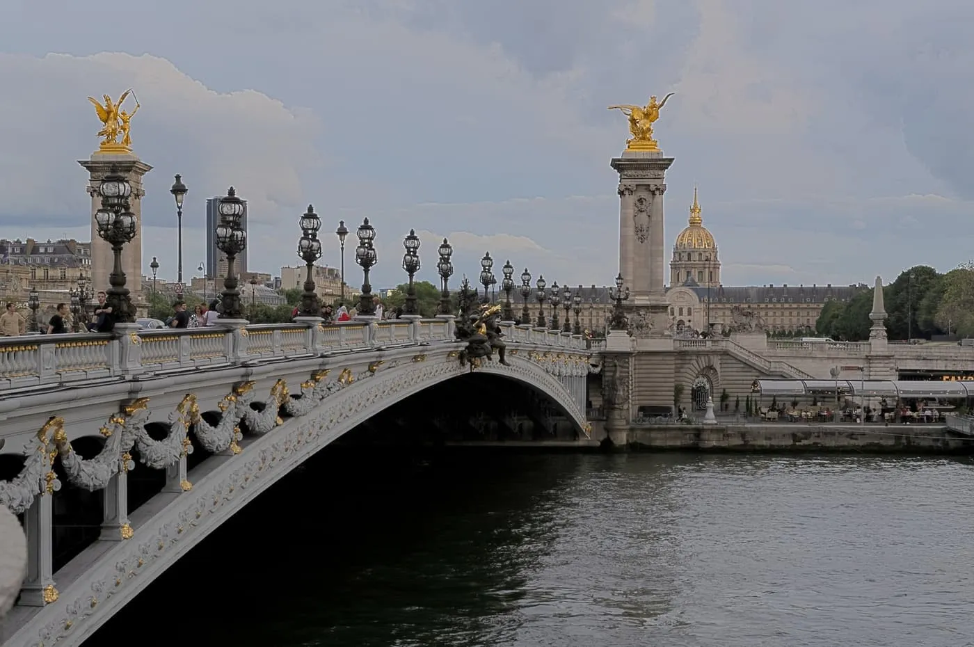 The Pont Alexandre III over the Seine, with its gilded statues and the dome of Les Invalides behind